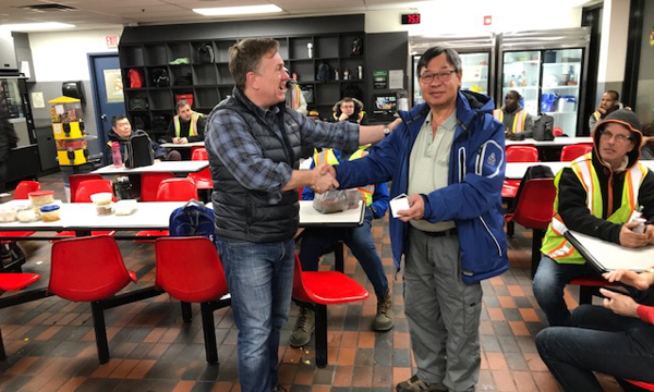 Vance receives his 401 retirement ring from his Union Rep David