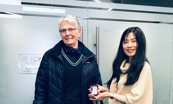 Lorna (pictured left) receives her 401 gold retirement ring from our fabulous Admin Carol
