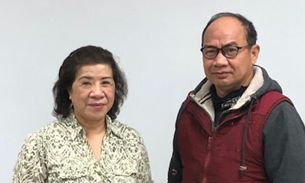 Loan receives her retirement ring from Shop Steward Carmelo