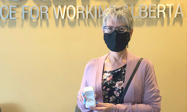 Denyse pops into the union office to pick up her retirement ring