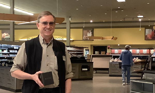 While helping to set up the new store conversion, Terry receives his retirement UFCW 401 gift