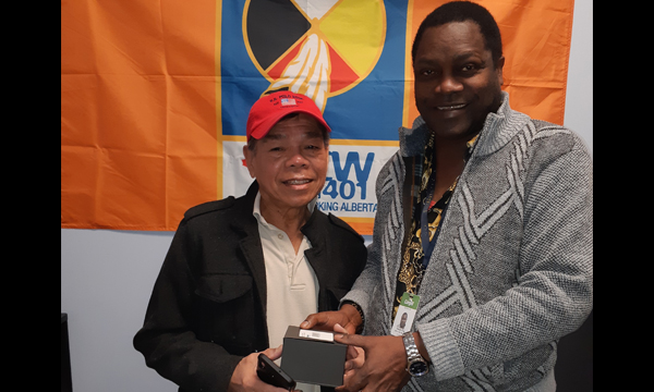 Samanh recieves his UFCW 401 retirement watch from Walking Steward Joseph
