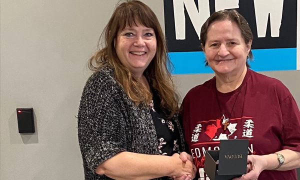 Yvonne receives her UFCW 401 retirement gift from her union rep Cheryl