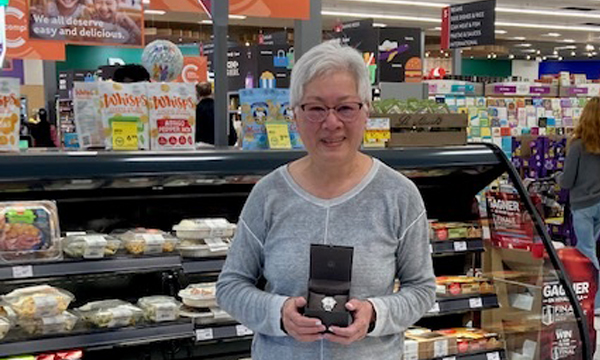 Amy receives her retirement gift