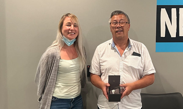 David pops into the union office to pick up his retirement gift from 401 Admin Cassandra